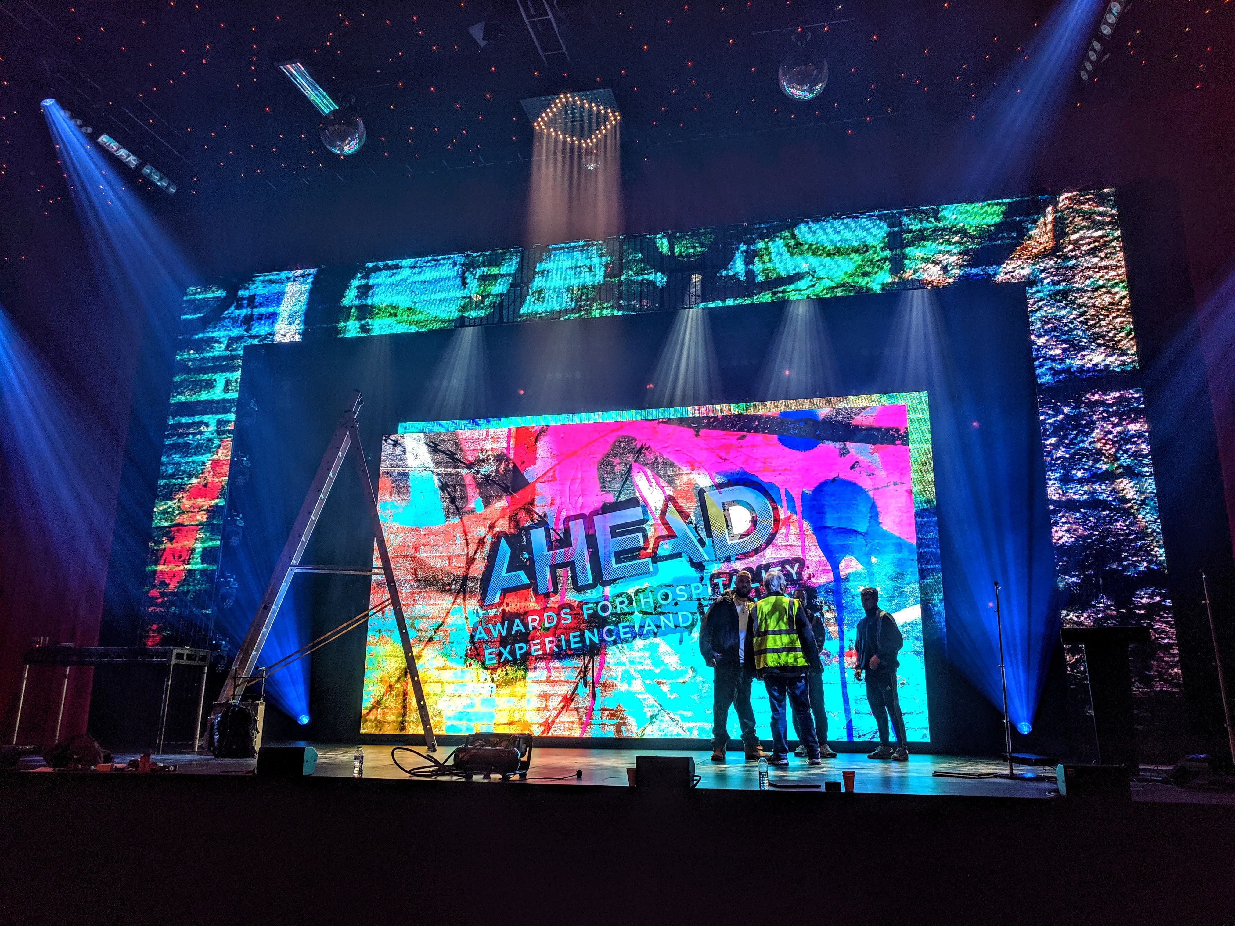 AHEAD Awards LED video wall build, crew on stage