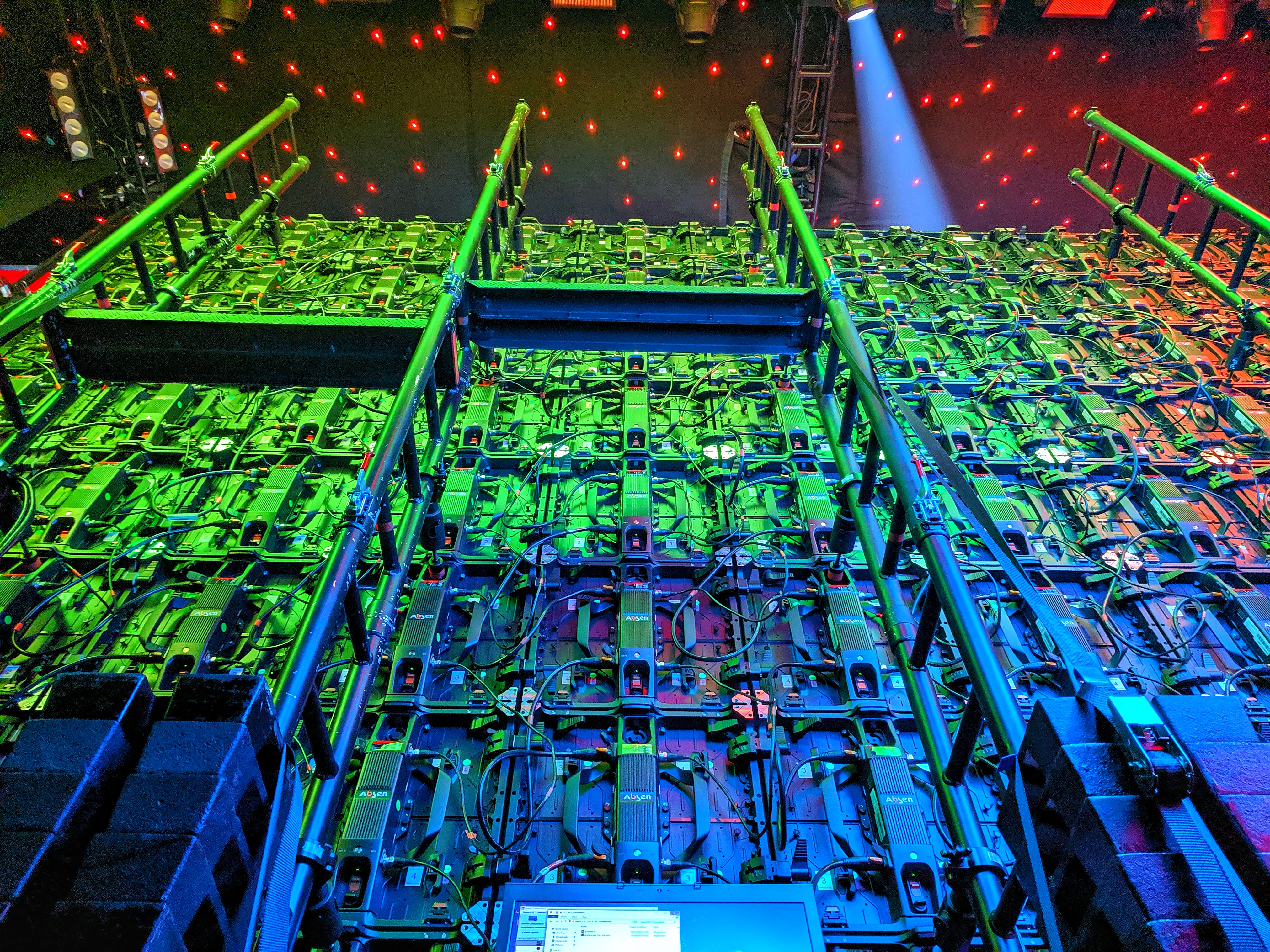 Large LED wall panels rigged on truss, viewed from behind
