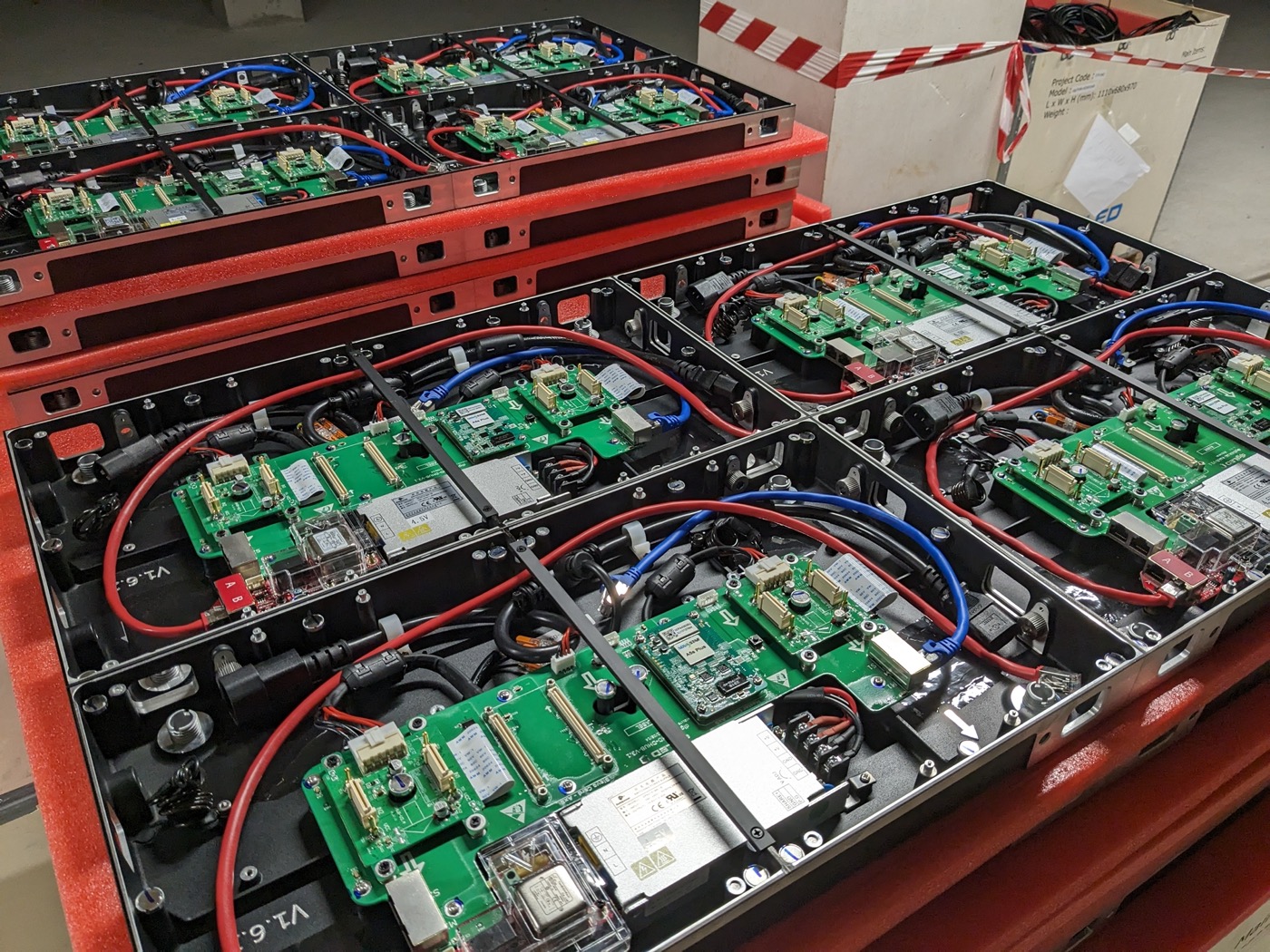 Rear of LED panels showing receiving cards during prep