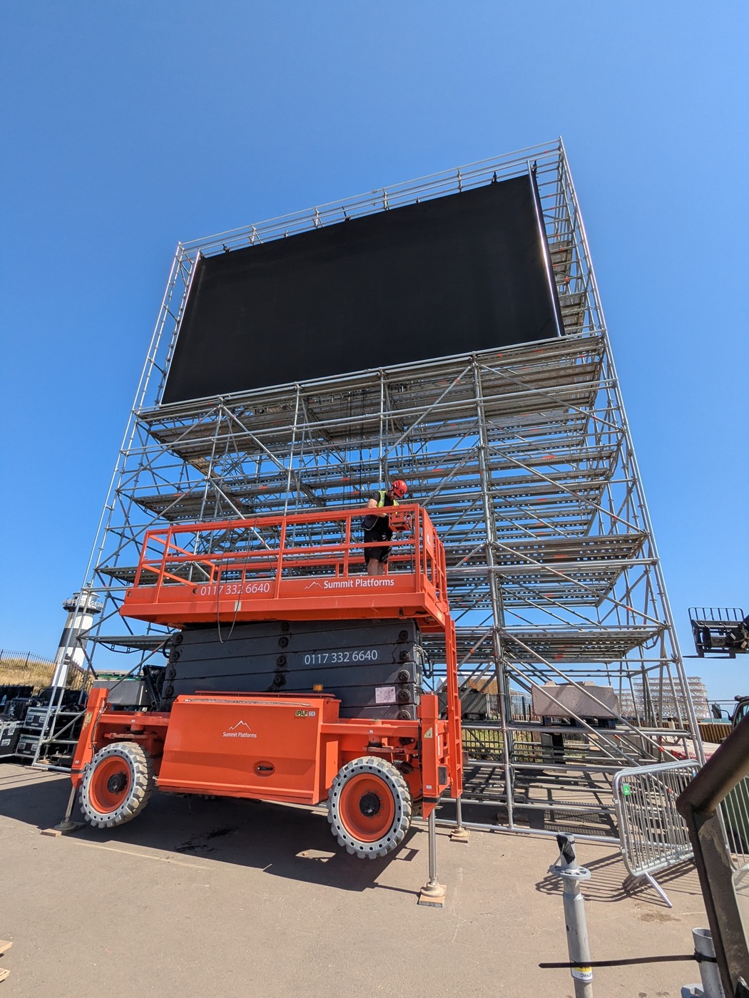 LED screen and scaffold structure viewed from below during build