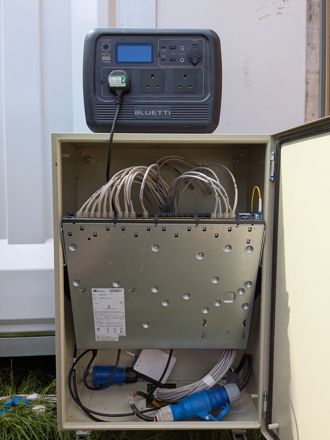 Outdoor network cabinet with switch, patched cabling and battery power